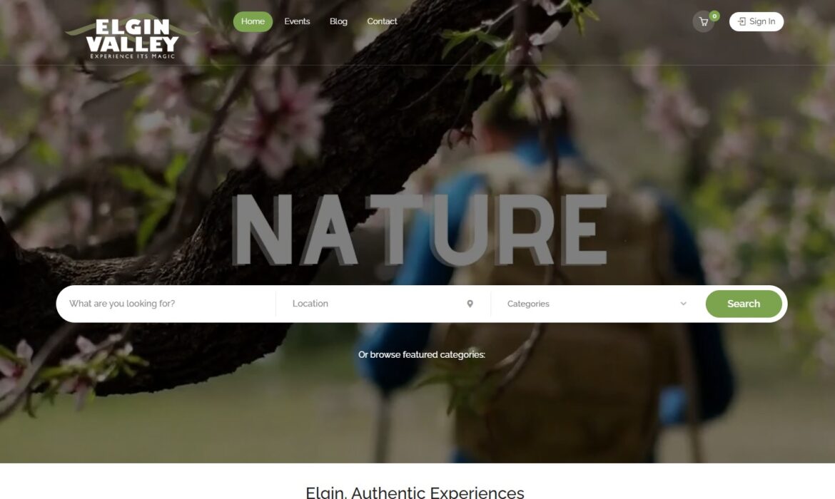 Elgin Valley tourism: hiker in nature with "NATURE" text overlay