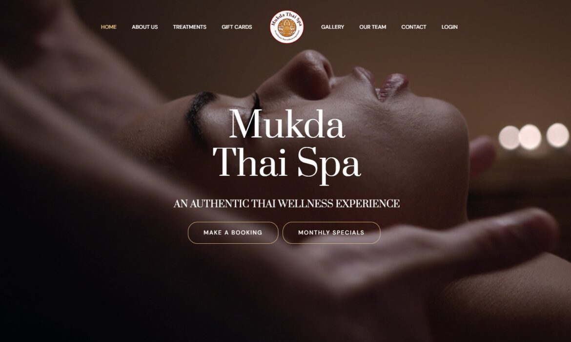 Mukda Thai Spa logo and serene image of a person receiving a head massage