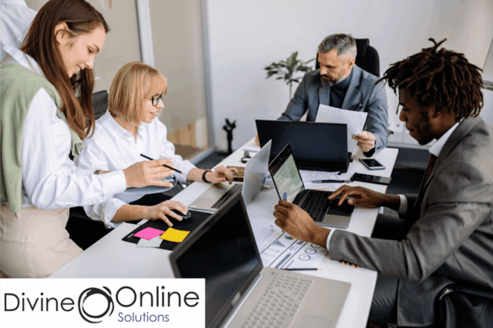 Business professionals reviewing technology systems that support business growth and improve productivity.