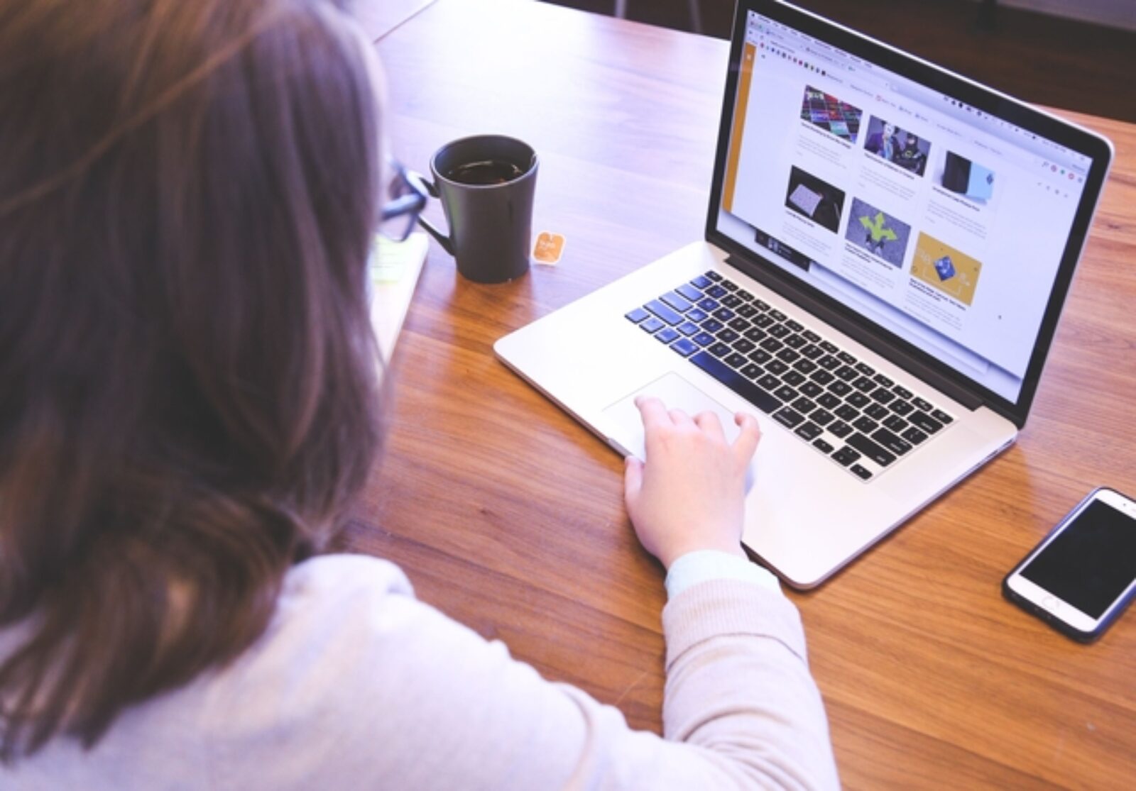 Business owner analysing a slow website's loading speed and its impact on customer experience and online sales.