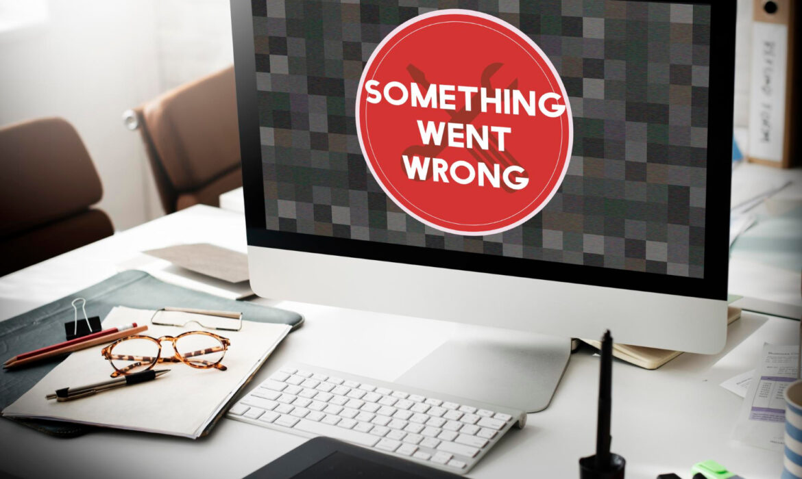 computer with text saying "something went wrong" to illustrate what can happen if a website breaks