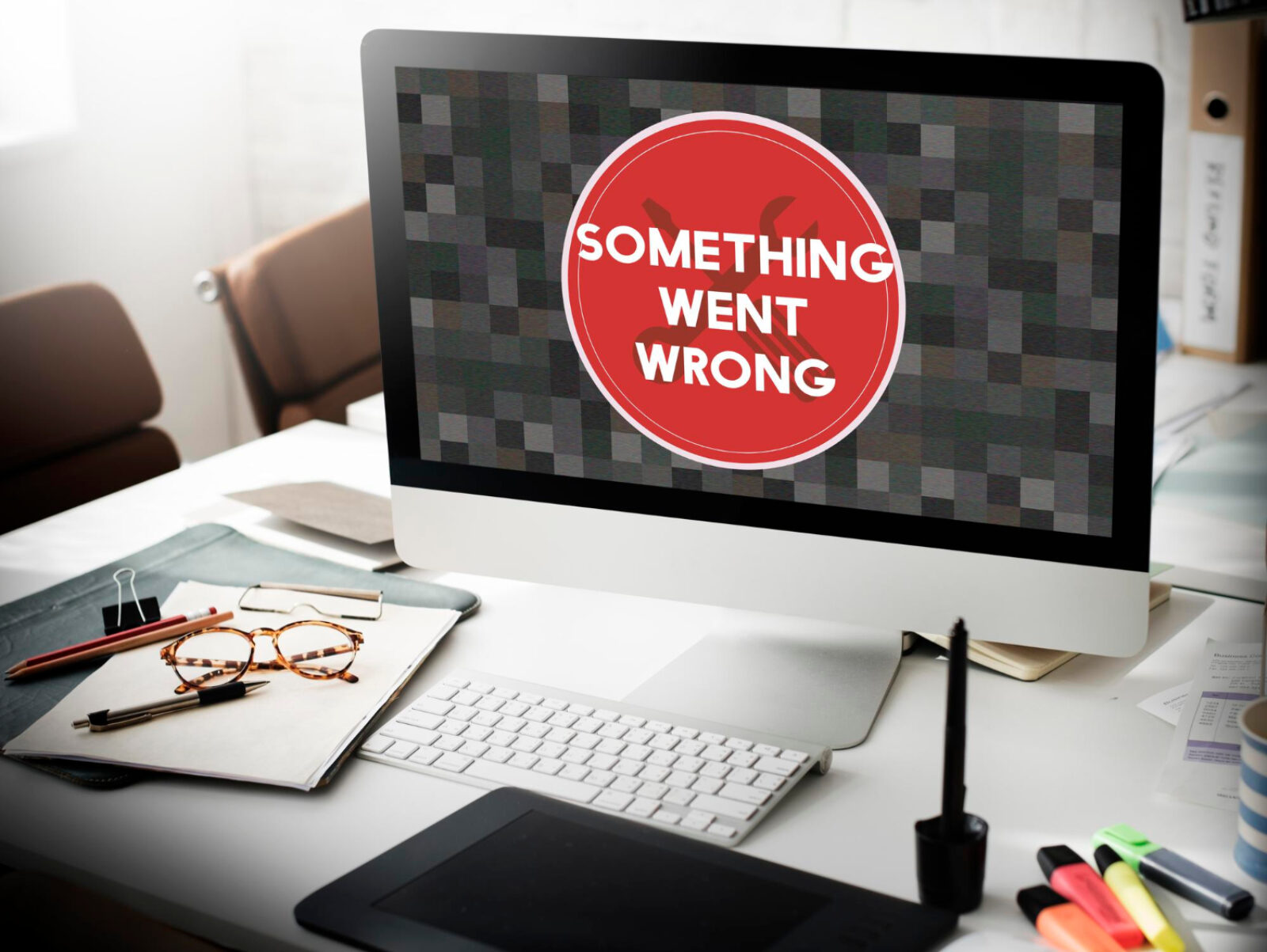 computer with text saying "something went wrong" to illustrate what can happen if a website breaks